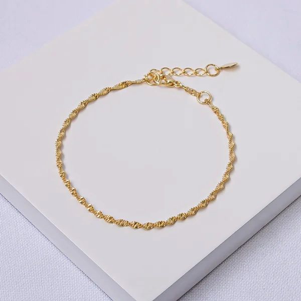 Pulseira torcida diamantada