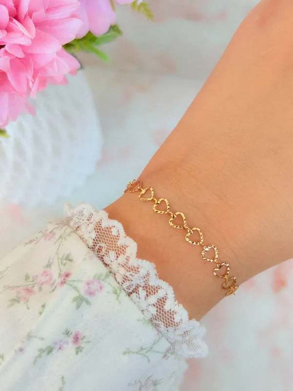 Pulseira corações vazados 
