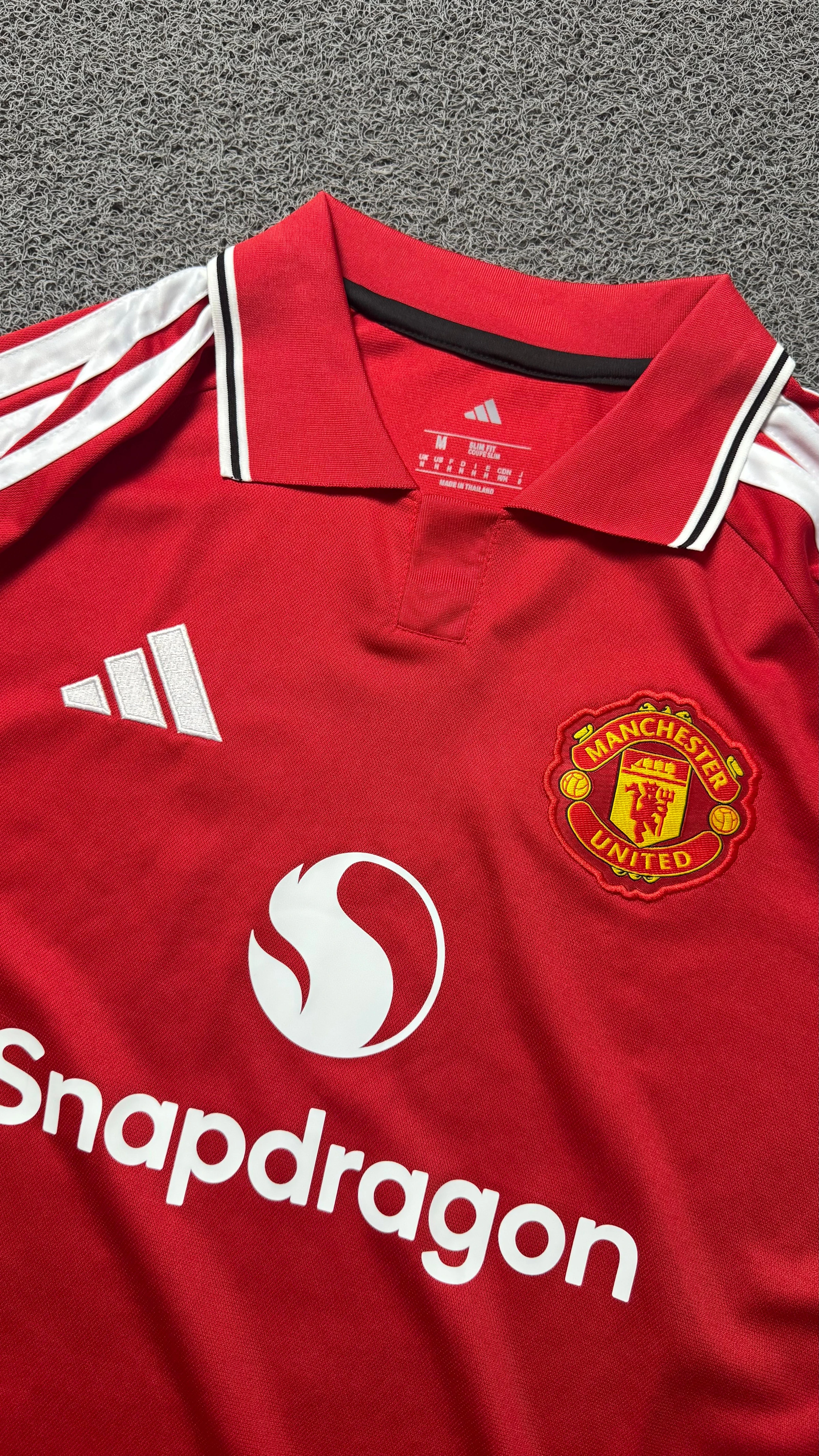 MANCHESTER UNITED TITULAR 26/27 TORCEDOR - 2