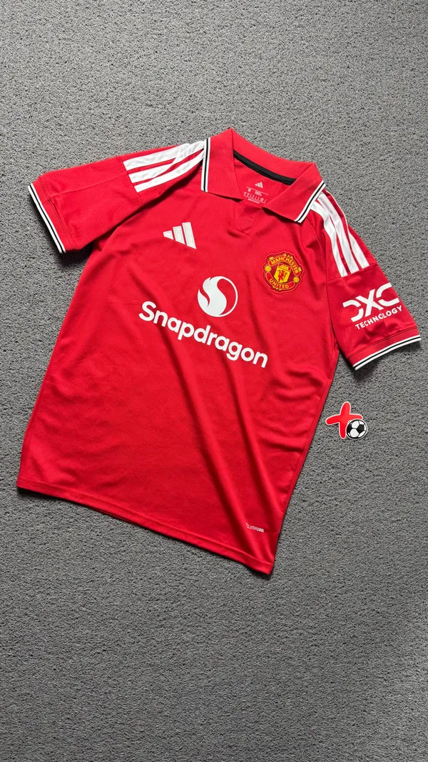 MANCHESTER UNITED TITULAR 26/27 TORCEDOR