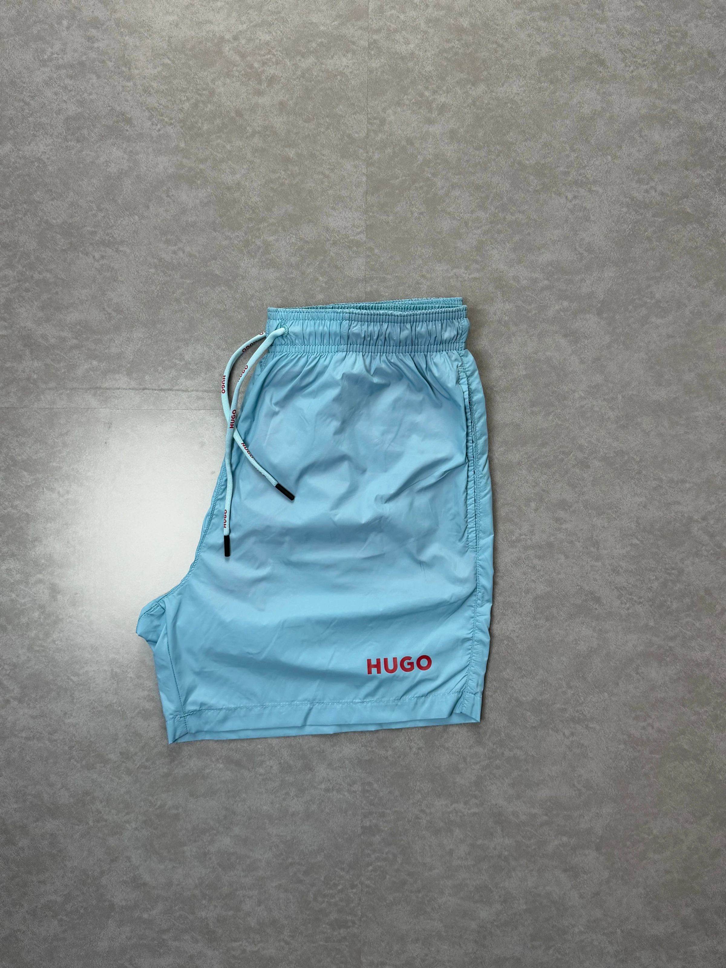 Shorts praia hugo azul bebê  - 1