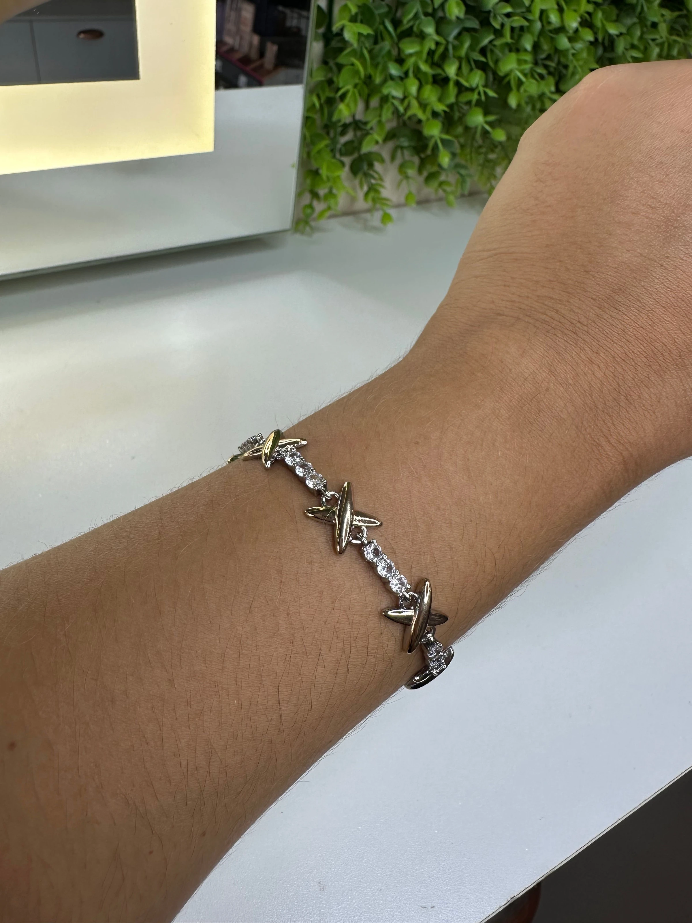 Pulseira dourada e prata  - 1