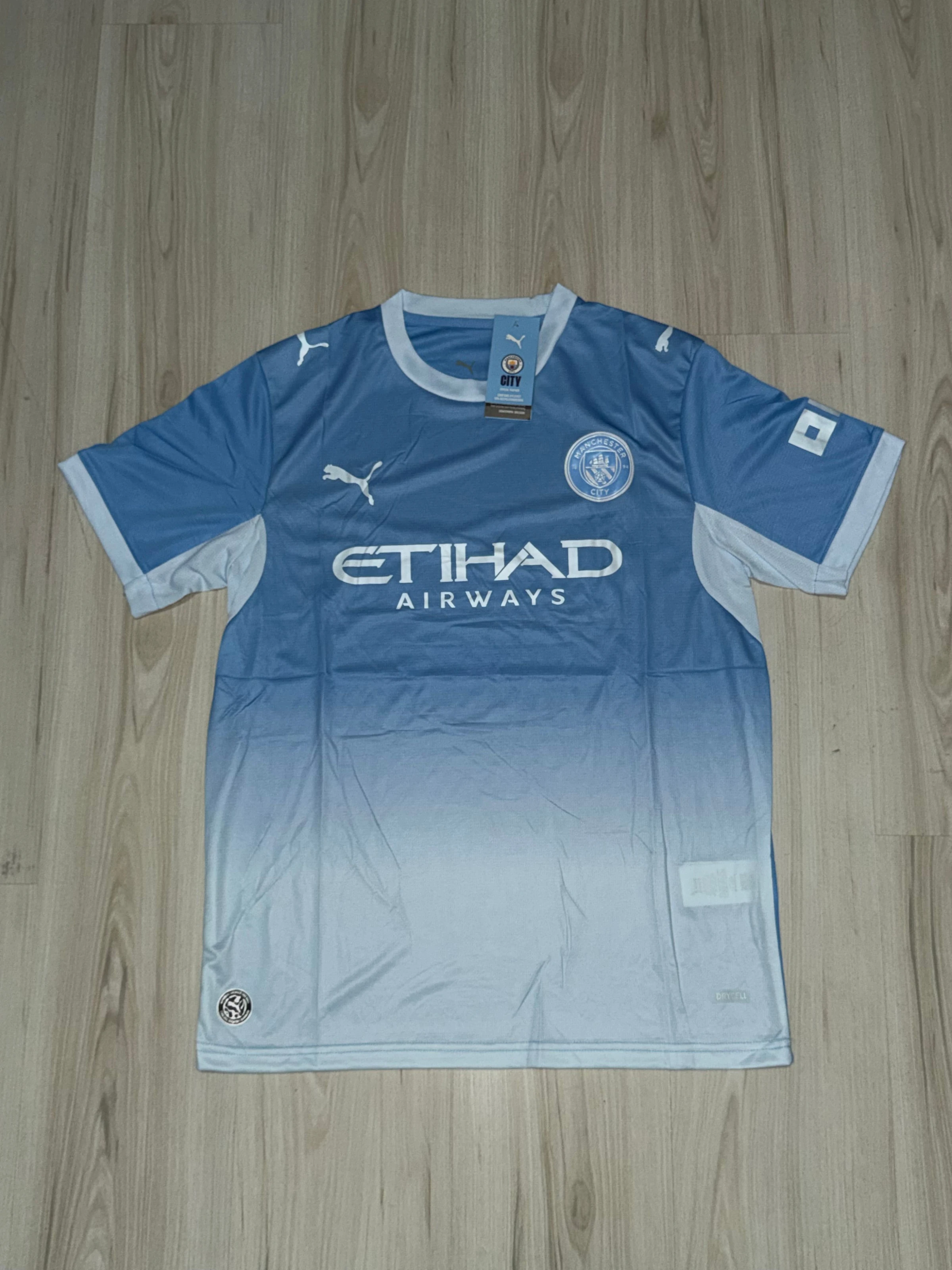 CAMISA I MANCHESTER CITY 26/27 - 1