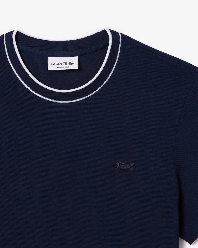 Camiseta Lacoste azul marinho gola detalhada 