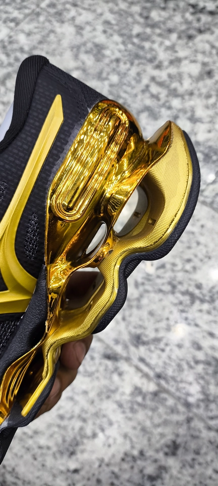 Mizuno 15 preto e dourado  - 8
