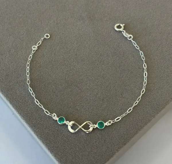 Pulseira infinito c 2 pontos de luz tiffany