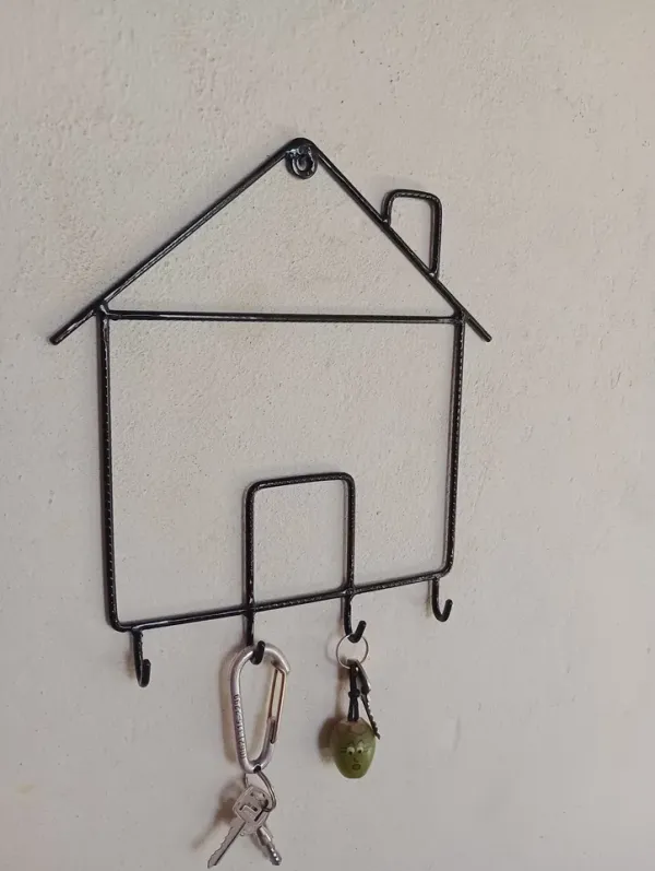 Porta chave no designer de casinha.