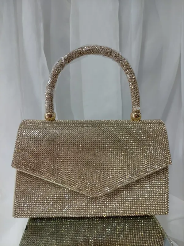 134 BOLSA FESTA DOURADA STRASS - BOL 134